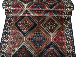 Corner detail of 2000s Yalameh rug showing border pattern and Wool pile