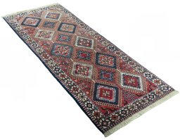 Close-up detail of 2000s Yalameh rug from Iran / Persia showing Wool weave