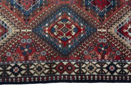 Full view of 2000s Yalameh rug from Iran / Persia, 197 × 77 cm in Red tones