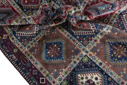 Corner detail of 2000s Yalameh rug showing border pattern and Wool pile
