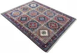 Close-up detail of 2000s Yalameh rug from Iran / Persia showing Wool weave