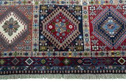 Central medallion detail of 2000s Yalameh rug from Iran / Persia