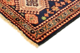 Backside of handmade 1990s Yalameh rug showing knot structure and weave density