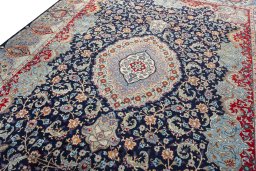 Backside of handmade 1970s Kashmar rug showing knot structure and weave density