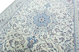 Backside of handmade 2000s Nain rug showing knot structure and weave density