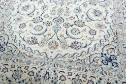 Close-up detail of 2000s Nain rug from Iran / Persia showing Wool weave