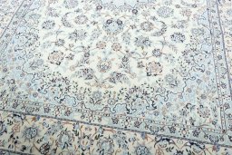 Close-up detail of New Nain rug from Iran / Persia showing Wool weave