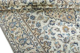 Close-up detail of New Kashan rug from Iran / Persia showing Wool weave