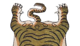 Backside of handmade New Farahan rug showing knot structure and weave density