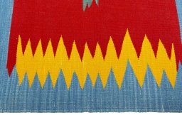 Close-up detail of New Kilim Sofre rug from Turkey showing Wool weave