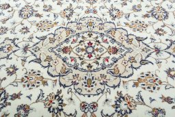 Central medallion detail of 2000s Kashan rug from Iran / Persia