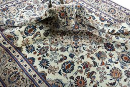 Surface texture of 2000s Kashmar rug with natural Wool and intricate pattern