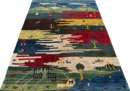 Surface texture of 2000s Persian Gabbeh rug with natural Wool and intricate pattern