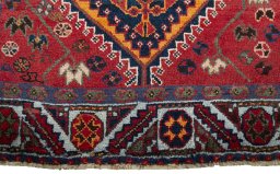 Central medallion detail of 2000s Shiraz rug from Iran / Persia