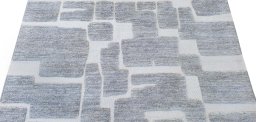 Backside of handmade New Morocco rug showing knot structure and weave density