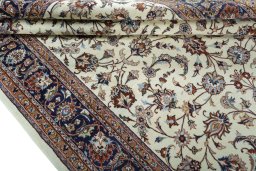 Close-up detail of 2000s Mashad rug from Iran / Persia showing Wool weave