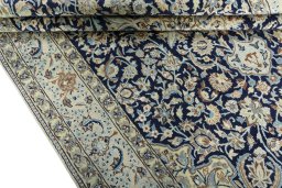 Close-up detail of 2000s Nain rug from Iran / Persia showing Wool weave
