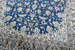Close-up detail of 2000s Nain rug from Iran / Persia showing Wool weave