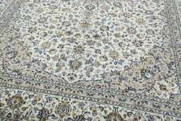 Close-up detail of 2000s Kashan rug from Iran / Persia showing Wool weave