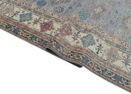 Close-up detail of New Kazak rug from Pakistan showing Wool weave