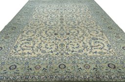 Surface texture of 2000s Kashan rug with natural Cork and intricate pattern