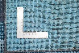 Close-up detail of 1960s Patchwork rug from Iran / Persia showing Wool weave