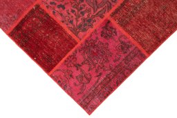 Backside of handmade 1960s Patchwork rug showing knot structure and weave density