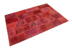 Corner detail of 1960s Patchwork rug showing border pattern and Wool pile