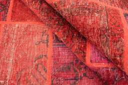 Full view of 1960s Patchwork rug from Iran / Persia, 240 × 170 cm in Red tones