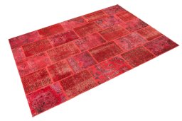 Corner detail of 1960s Patchwork rug showing border pattern and Wool pile