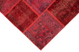 Backside of handmade 1960s Patchwork rug showing knot structure and weave density