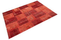 Corner detail of 1960s Patchwork rug showing border pattern and Wool pile