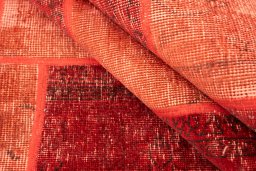 Close-up detail of 1960s Patchwork rug from Iran / Persia showing Wool weave