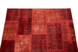 Full view of 1960s Patchwork rug from Iran / Persia, 240 × 170 cm in Red tones