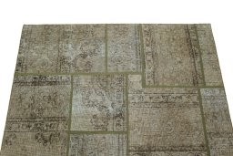Surface texture of 1960s Patchwork rug with natural Wool and intricate pattern
