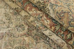 Close-up detail of 1920s Vintage rug from Iran / Persia showing Wool weave