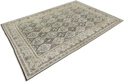 Corner detail of 1990s Vintage rug showing border pattern and Silk pile