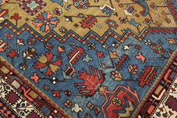 Full view of 1900s Vintage rug from Iran / Persia, 562 × 273 cm in Green tones