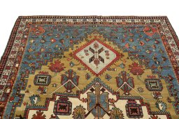 Surface texture of 1900s Vintage rug with natural Wool and intricate pattern