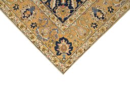 Backside of handmade 1940s Vintage rug showing knot structure and weave density