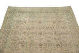 Surface texture of 1920s Vintage rug with natural Wool and intricate pattern