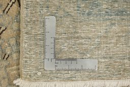 Close-up detail of 1920s Vintage rug from Iran / Persia showing Wool weave