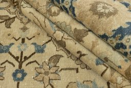 Close-up detail of 1920s Vintage rug from Iran / Persia showing Wool weave