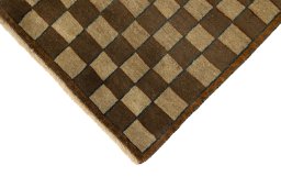 Backside of handmade New Vintage rug showing knot structure and weave density