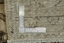 Corner detail of 1940s Vintage rug showing border pattern and Wool pile