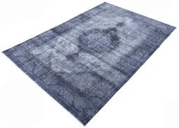 Corner detail of 1970s Vintage rug showing border pattern and Wool pile