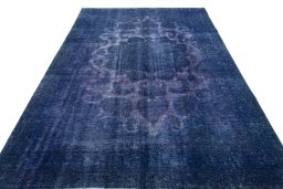 Surface texture of 1970s Vintage rug with natural Wool and intricate pattern