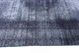 Corner detail of 1970s Vintage rug showing border pattern and Wool pile