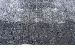 Corner detail of 1970s Vintage rug showing border pattern and Wool pile