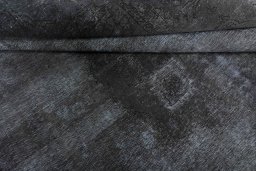 Close-up detail of 1970s Vintage rug from Iran / Persia showing Wool weave
